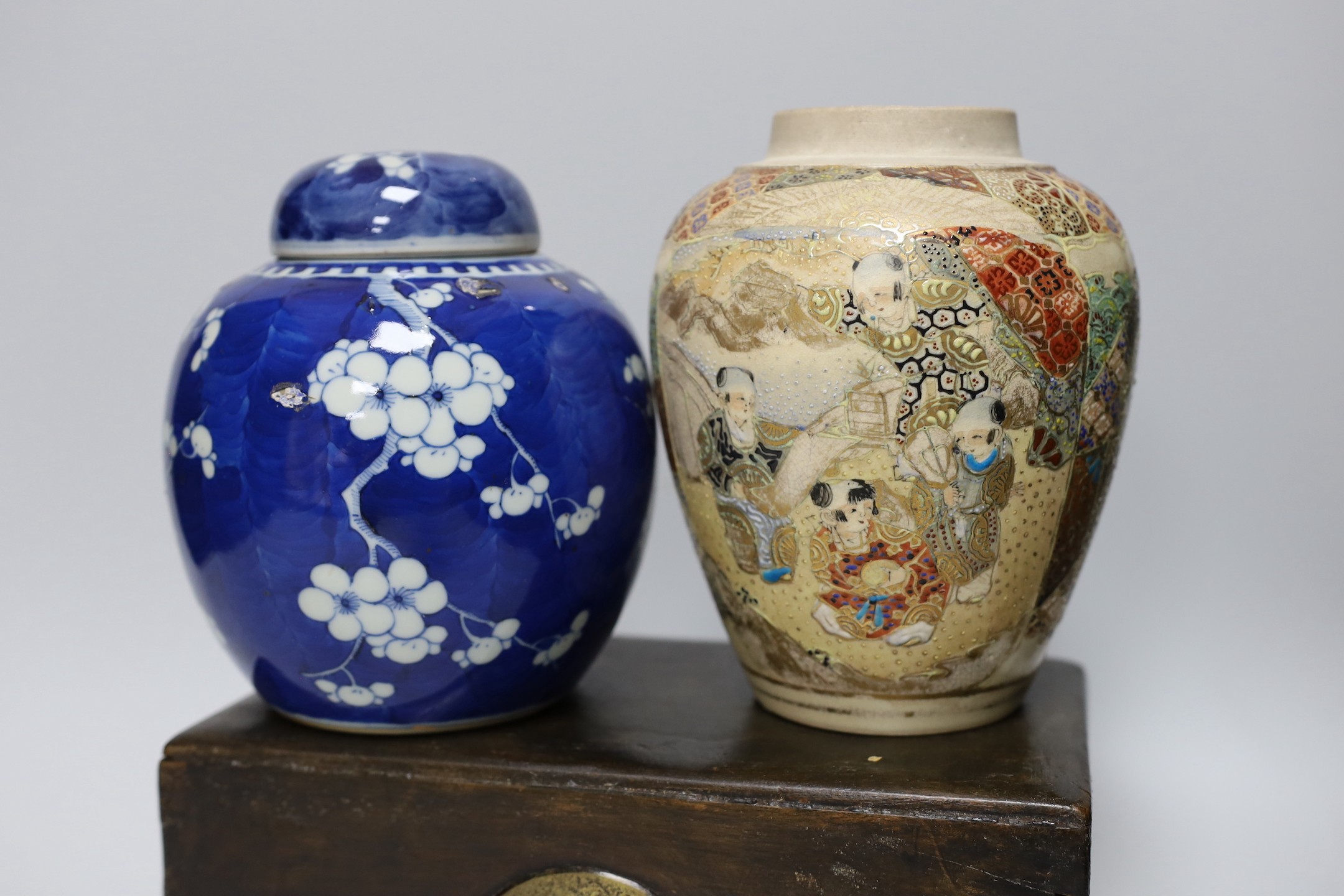 A Chinese Kangxi blue and white miniature vase, 9cm tall, a 19th century Chinese wood writing box, a famille rose jardiniere, blue and white jar and cover etc.